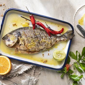 Τσιπούρα ή Λαβράκι στη σχάρα με dressing εσπεριδοειδών
